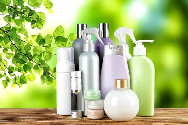 Set of body care products on green natural background — Stock Photo, Image