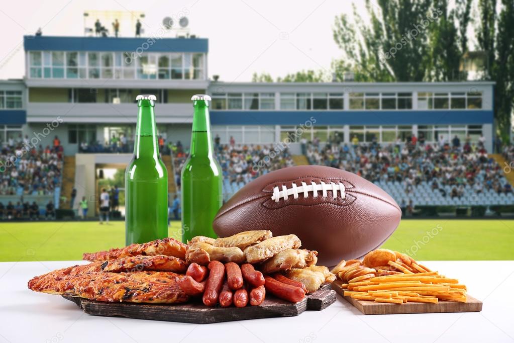 Ball, snacks and bottles of beer