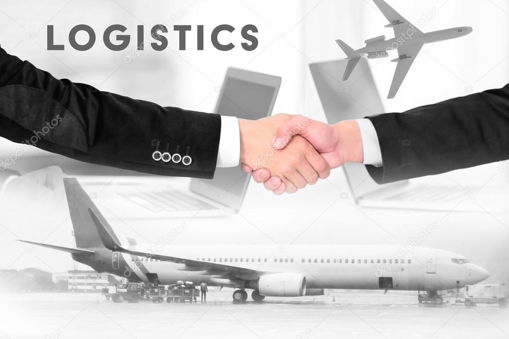 Logistics concept. Double exposure. Businessmen shaking hands and aircraft on background
