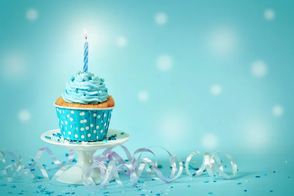 Delicious cupcake on table — Stock Photo, Image