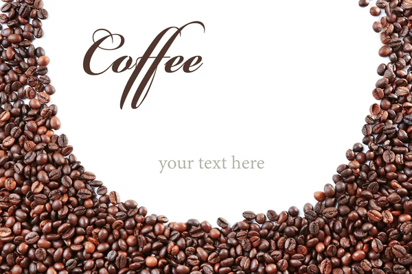 Roasted coffee beans with word COFFEE on white background. Space for text. — Stock Photo, Image