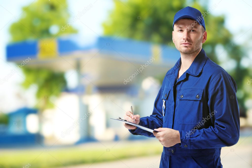 Young mechanic in uniform 