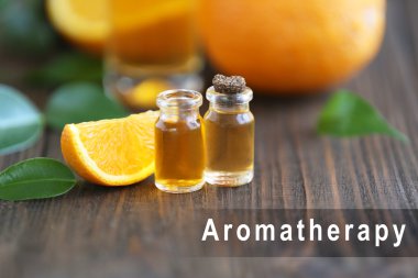 Özü ve dilim portakal, closeup Spa kompozisyonu. Arka plan üzerinde kelime aromaterapi. Spa güzellik kavramı.