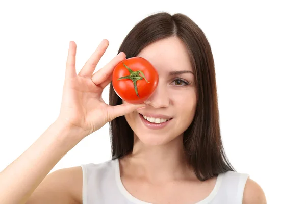 Portrait of young woman with tomato isolated on white — Stock Photo, Image