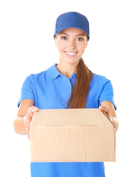 Mulher de entrega em uniforme com pacote no fundo branco — Fotografia de Stock