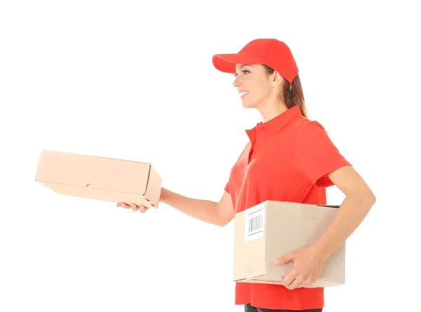 Delivery woman in uniform with parcels on white background — Stock Photo, Image