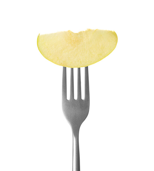 Fork with apple slice on white  background