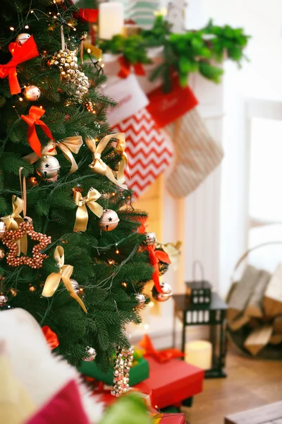 Close up view of beautiful decorated Christmas tree on blurred background — Stock Photo, Image