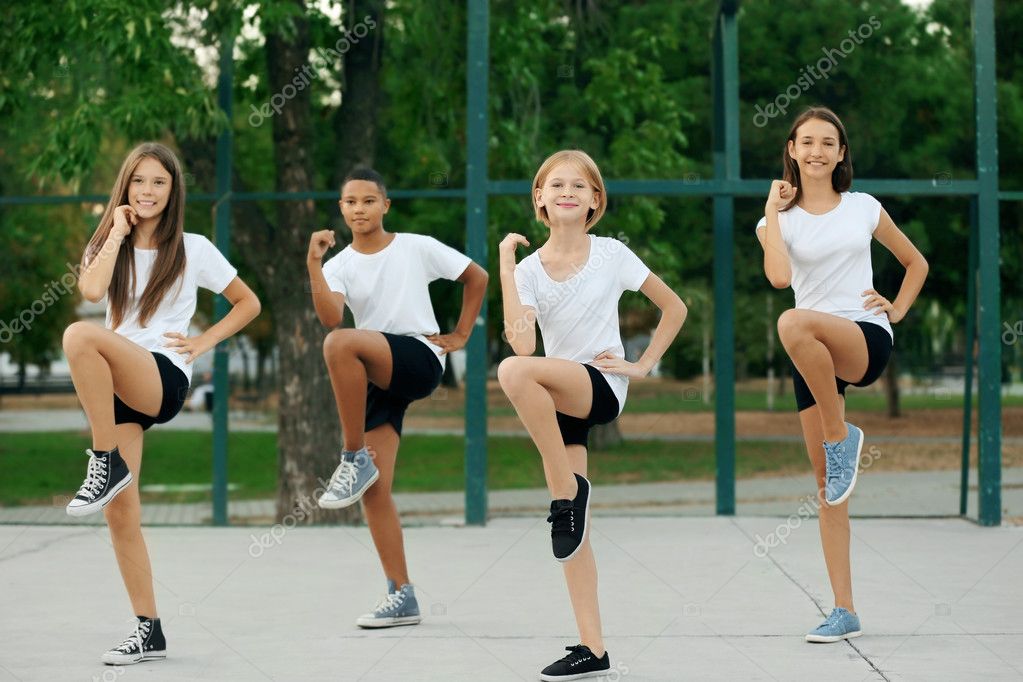 Students Doing Physical Exercises School Yard Stock Photo by