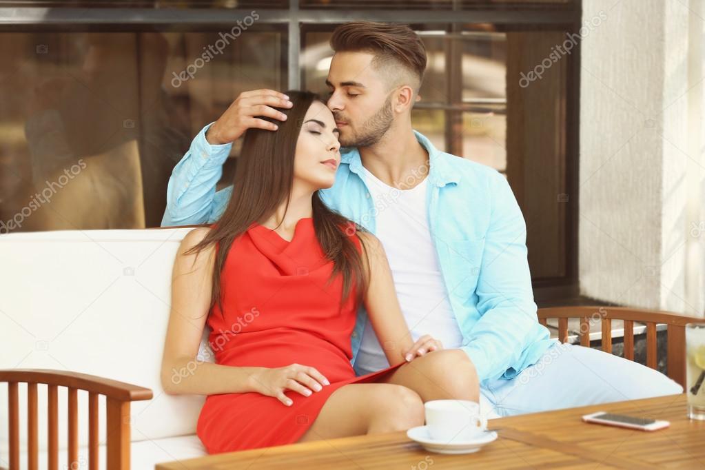 Happy lovely couple in cafe