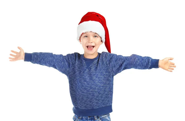 Bonito menino em chapéu de Papai Noel no fundo branco — Fotografia de Stock