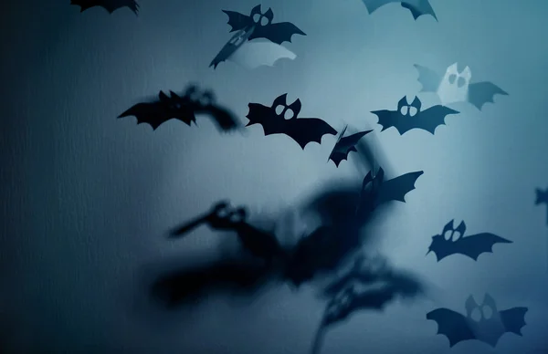 Paper bats on grey background as Halloween decor — Stock Photo, Image