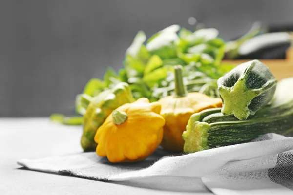 Fresh assorted squash on napkin