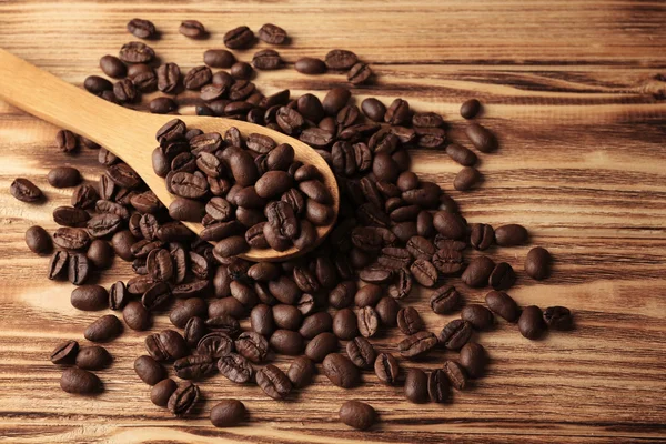 Spoon and coffee beans — Stock Photo, Image