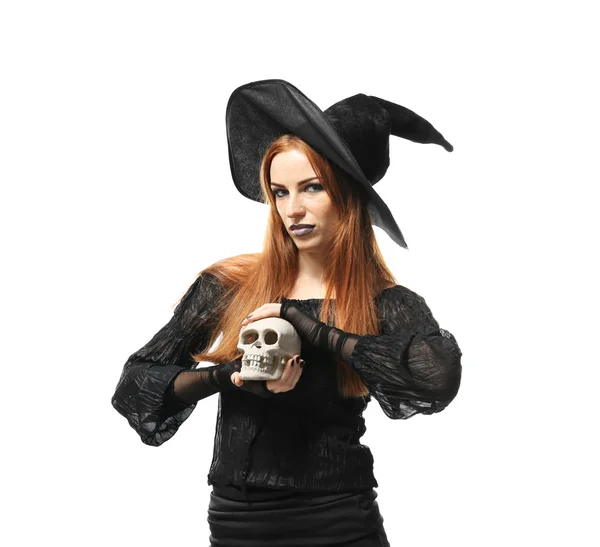 Young woman dressed in witch costume for Halloween, isolated on white — ストック写真