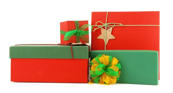 Christmas gifts in colourful boxes isolated on white — Stock Photo, Image