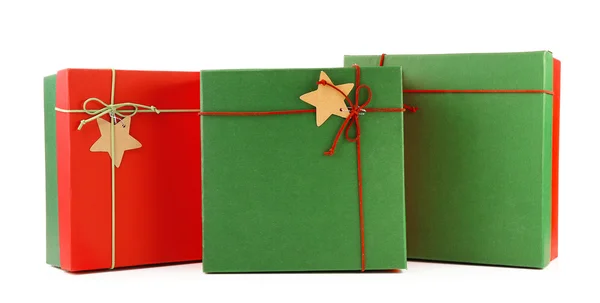 De giften van Kerstmis in kleurrijke vakken geïsoleerd op wit — Stockfoto