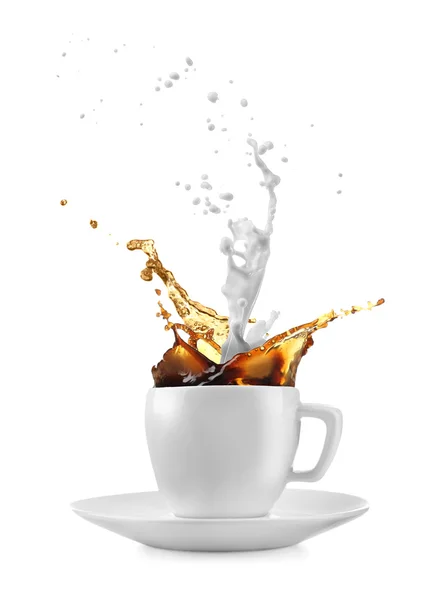 Cup with milk and coffee splashes on white background — Stock Photo, Image