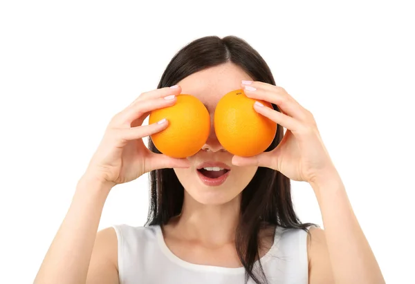 Portrait of young woman with two oranges isolated on white — Stock Photo, Image