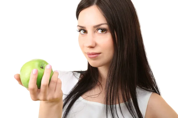 Портрет молодої жінки, що їсть зелене яблуко ізольовано на білому — стокове фото