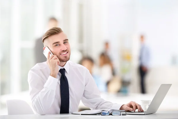 Young man working at modern office. — Stock Photo, Image