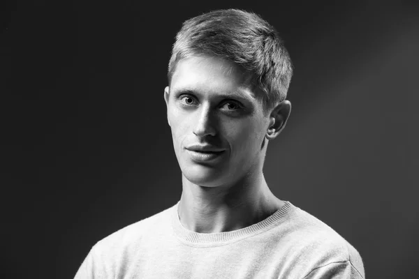 Black and white photo of young man — Stock Photo, Image