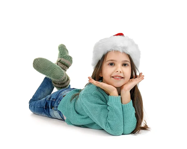 Menina bonito em chapéu de Santa no fundo branco — Fotografia de Stock