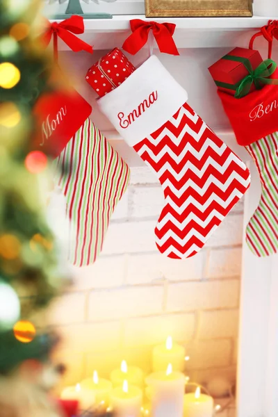 Christmas stocking on fireplace — Stock Photo, Image