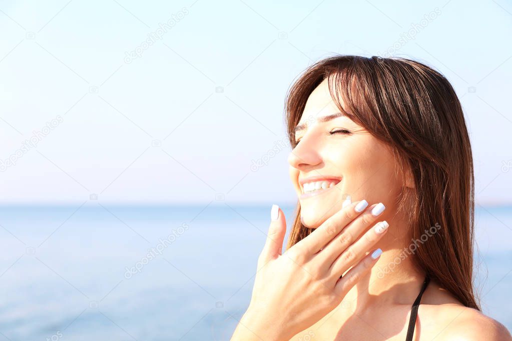 Image result for woman using sunscreen