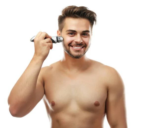 Handsome man shaving isolated on white — Stock Photo, Image