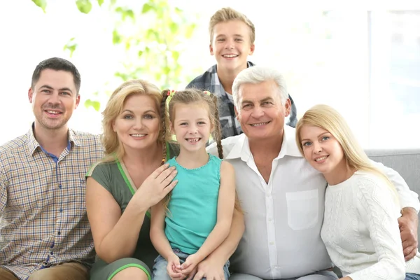 Happy family on couch at home