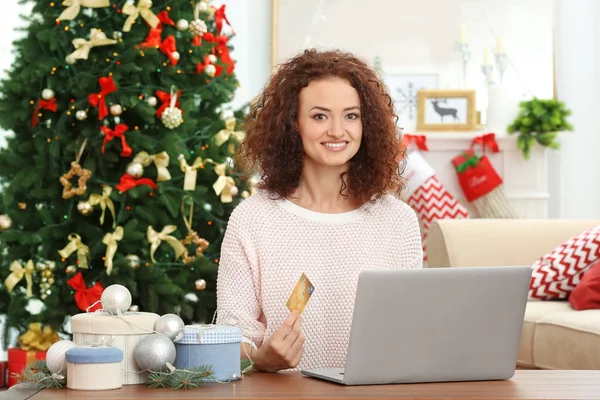 Woman ordering Christmas gifts — Stock Photo, Image