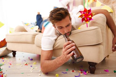 Tired drunk man after party clipart