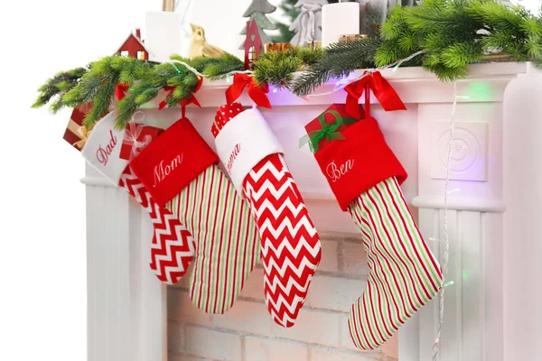 Fireplace with stocking decorated for Christmas, close up view — Stock Photo, Image