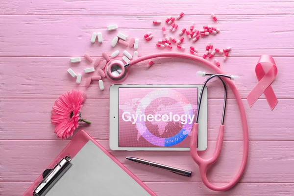 Ribbon and pink stethoscope — Stock Photo, Image