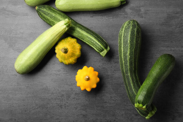 Fresh zucchini on color background