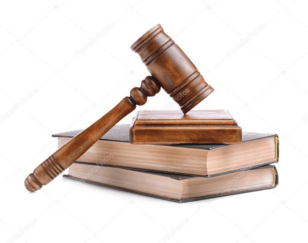 Gavel with sound block and books isolated on white