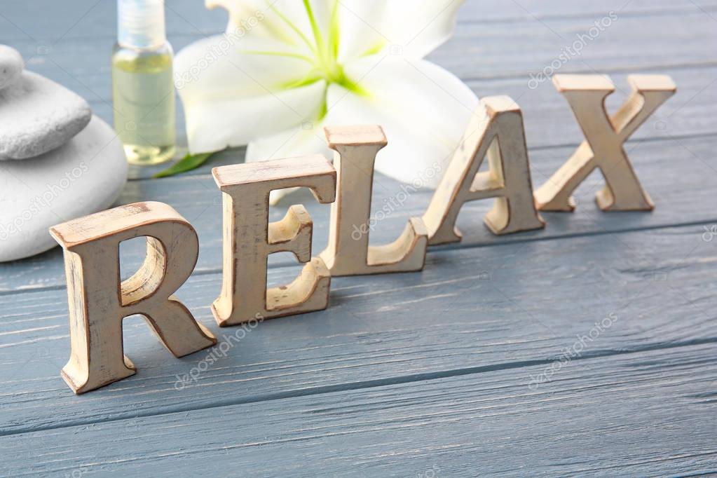 Word RELAX made of wooden letters