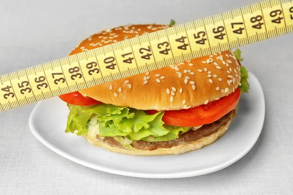 Dieting concept with measuring tape — Stock Photo, Image