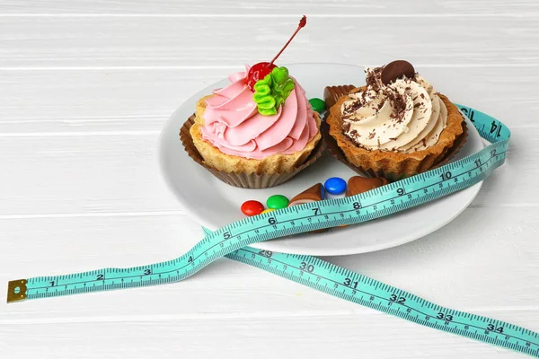 Dieting concept with measuring tape — Stock Photo, Image
