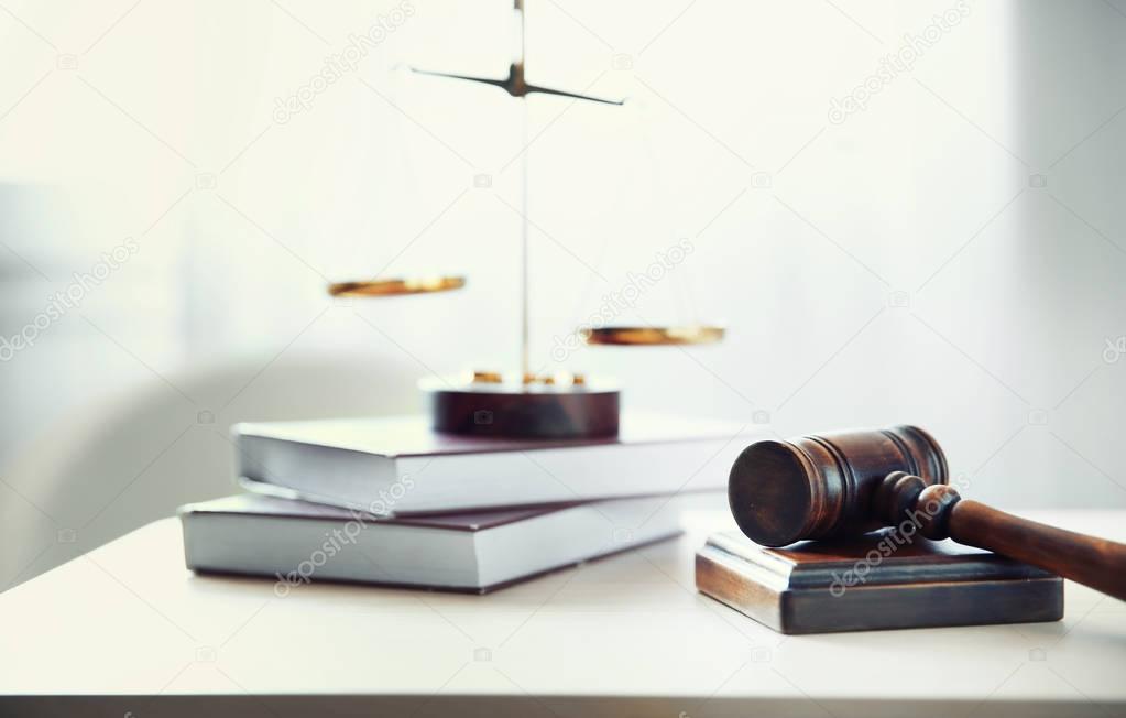 justice attributes on wooden table