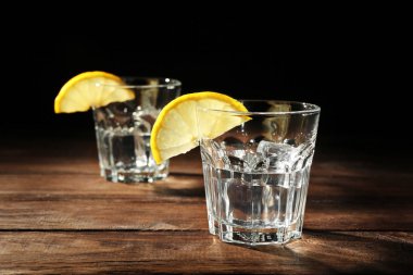 vodka with lemon and ice clipart