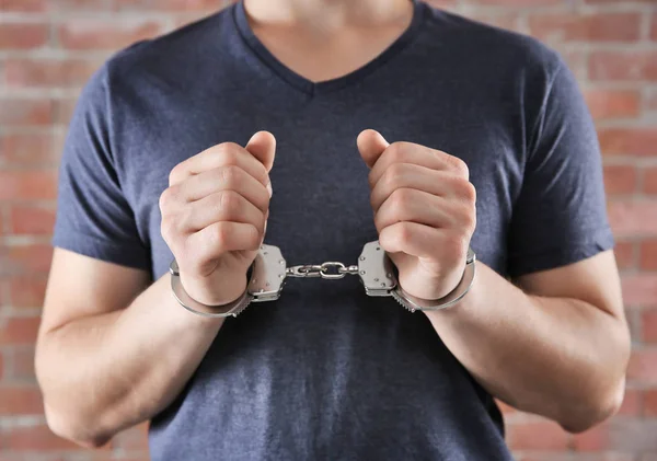 Young Man in handcuffs — Stock Photo, Image