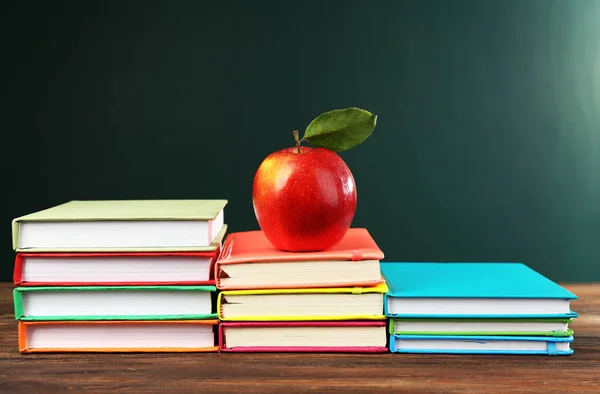 Concept with apple and books — Stock Photo, Image