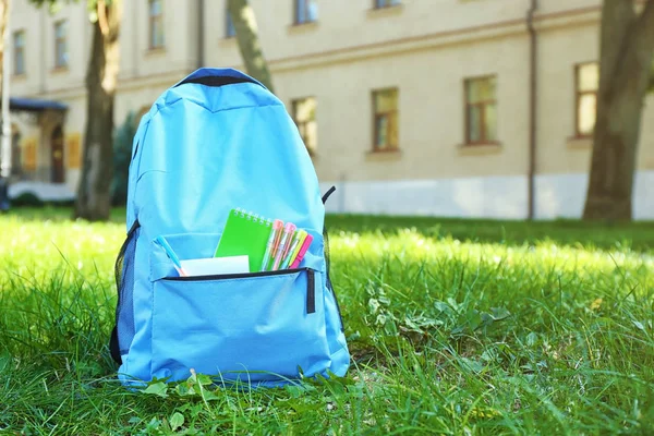 School backpack with accessories — Stock Photo, Image