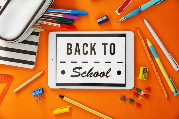 Colourful stationery and tablet with BACK TO SCHOOL — Stock Photo, Image