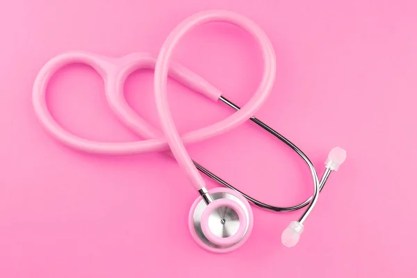 Pink stethoscope on pink — Stock Photo, Image