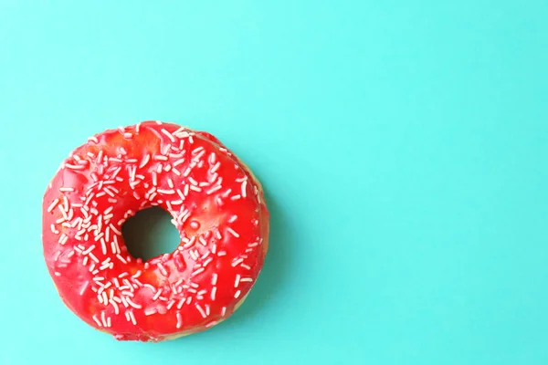 Delicious donut on pink — Stock Photo, Image