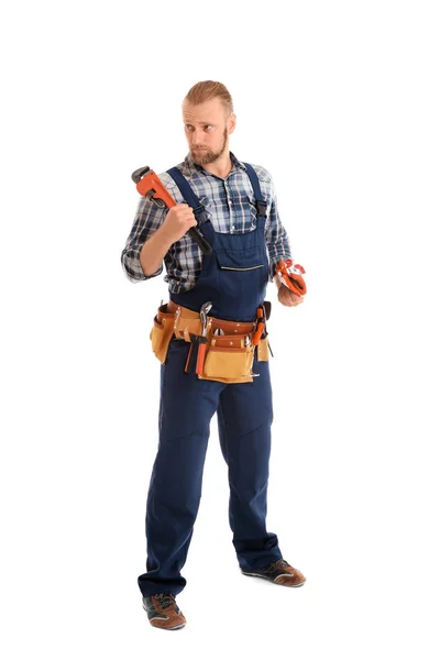 Handsome plumber with pipe wrench — Stock Photo, Image