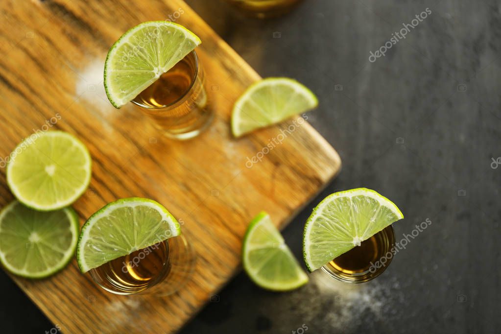 Gold tequila shots Stock Photo by ©belchonock 130128442